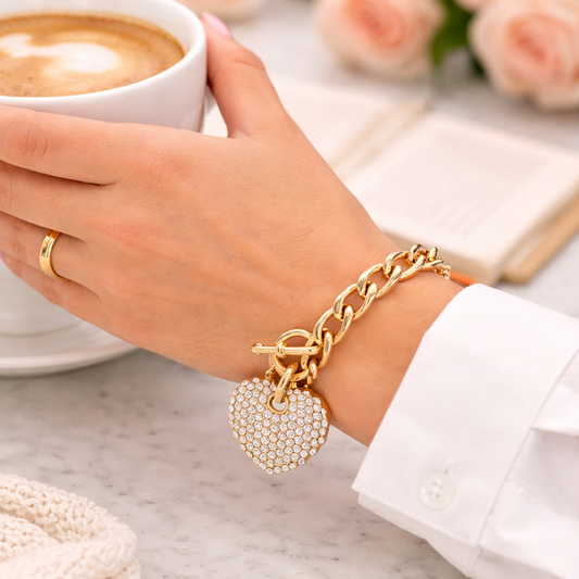 a hand holding a cup of coffee