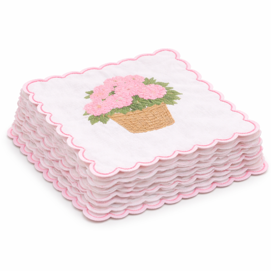a stack of napkins with a flower design