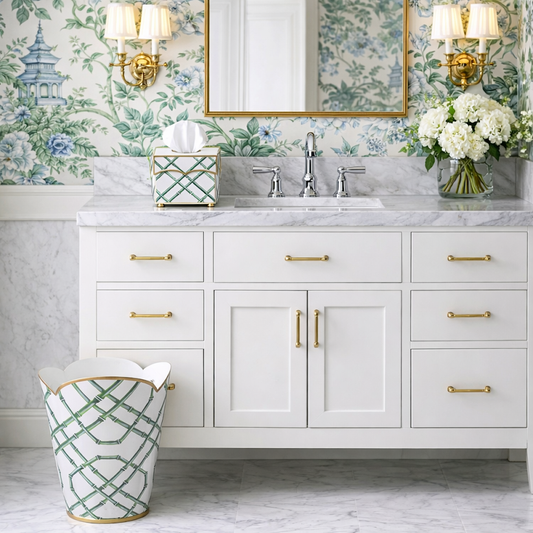 a bathroom with a mirror and flowers