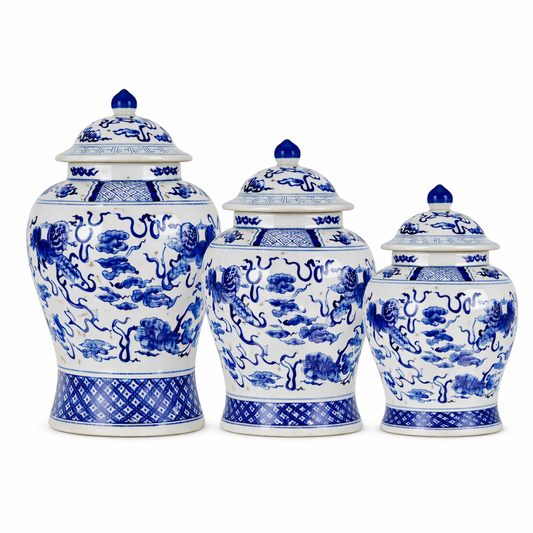 a group of blue and white porcelain jars