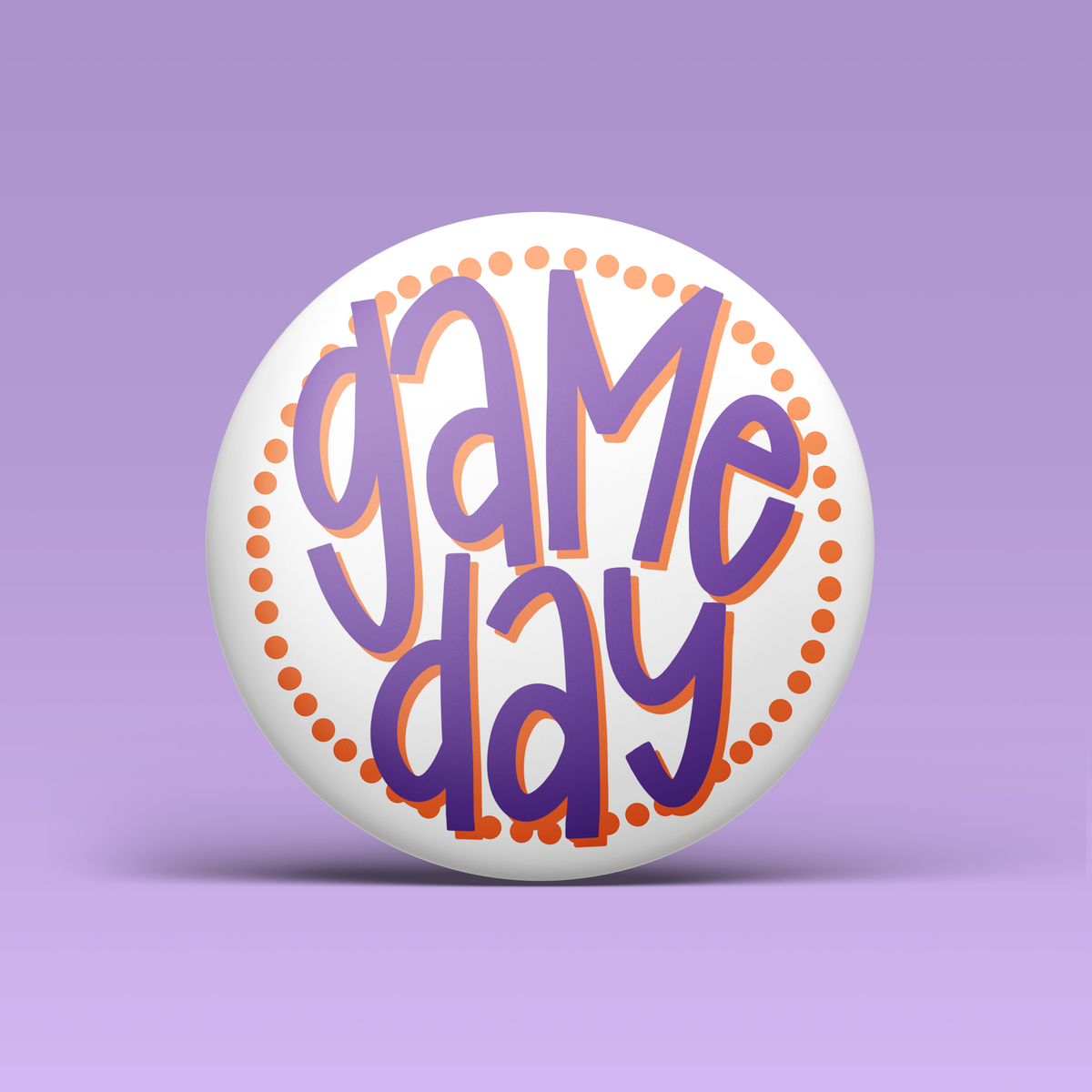 a white button with orange and purple lettering