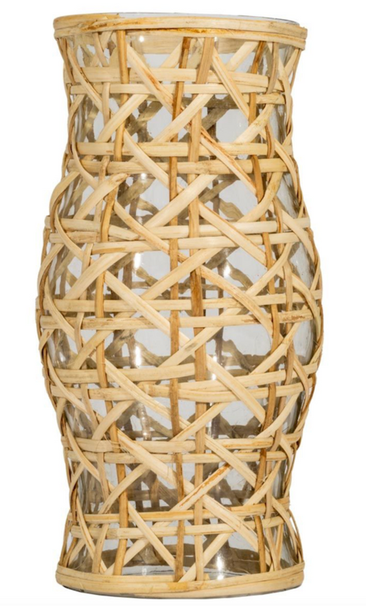 a glass vase with woven basket