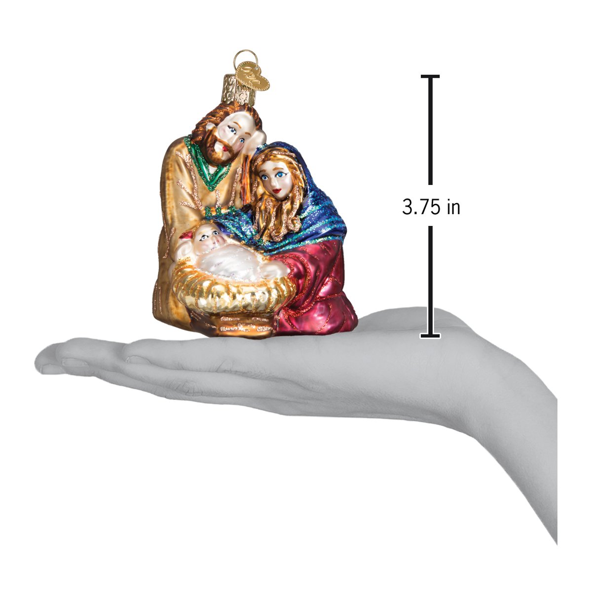 a hand holding a christmas ornament