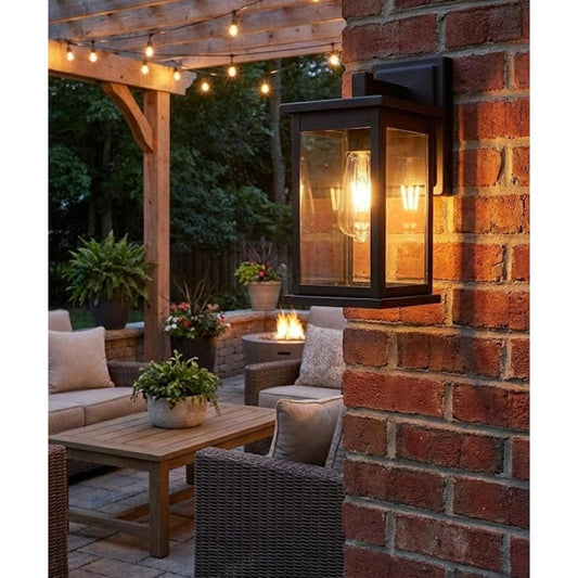 11"H Bowton II Outdoor Wall Light - Dusk to Dawn Matte Black Finish with Glass Shade by Millennium Lighting