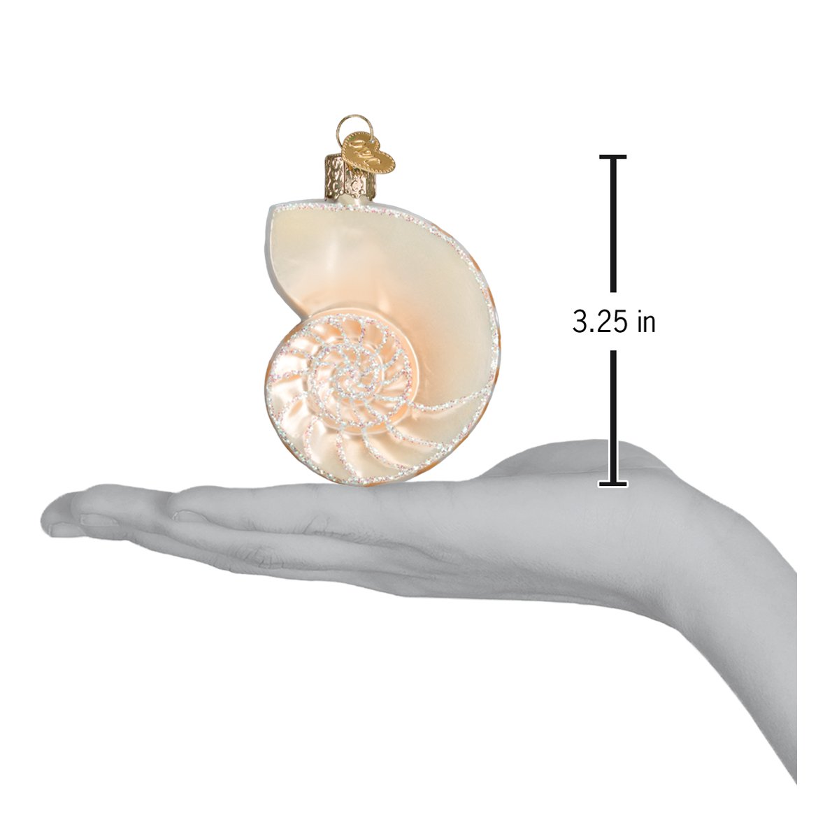 a hand holding a christmas ornament