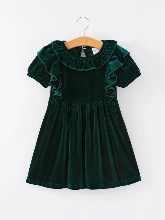 a green dress on a swinger