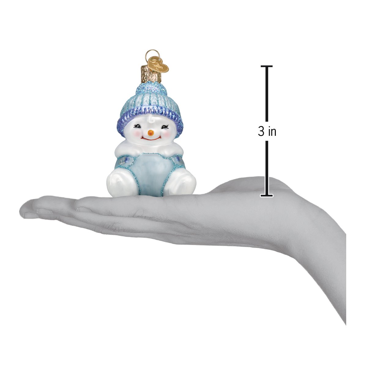 a hand holding a small snowman ornament