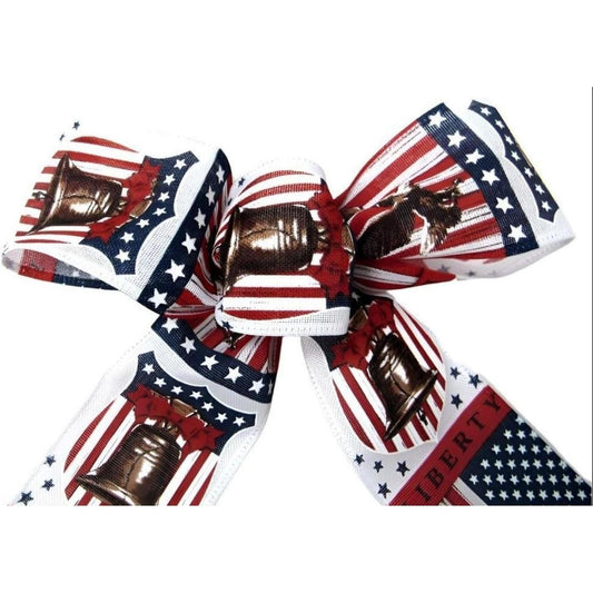 a bow with a picture of a bell and stars