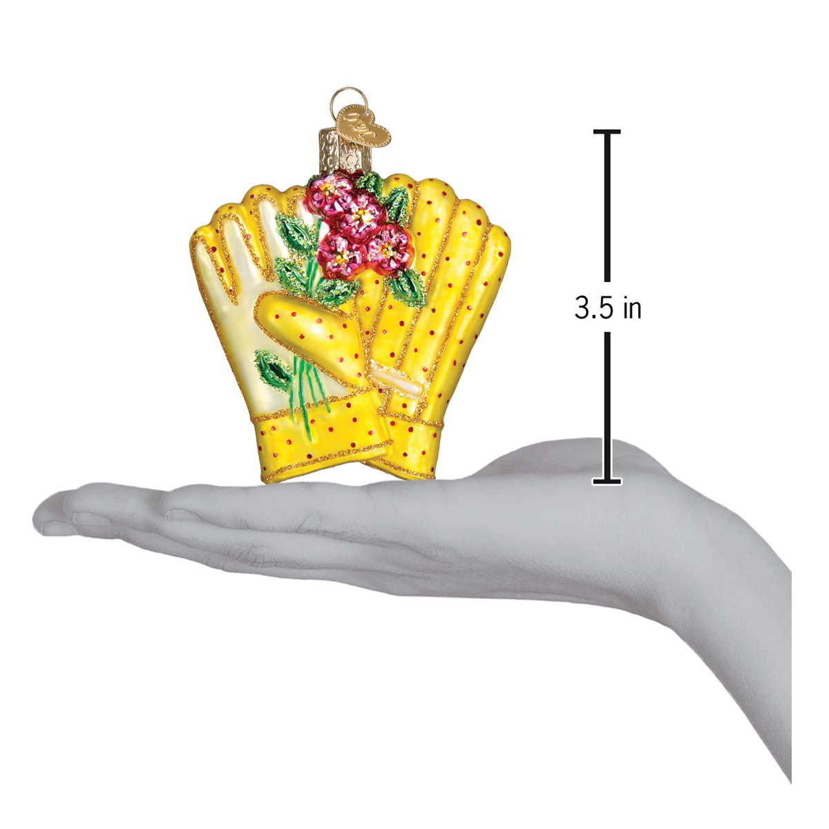 a hand holding a yellow glove with a flower and a small red rose