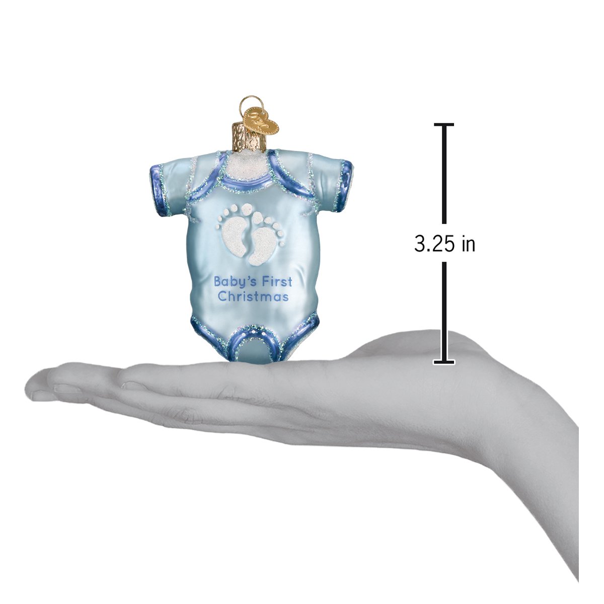 a hand holding a blue baby ornament