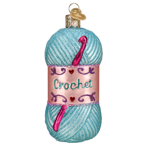 a blue and pink yarn ball ornament