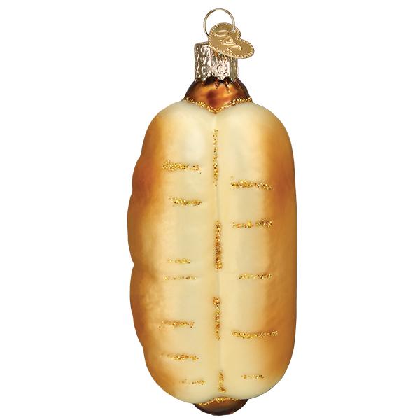 a hot dog ornament on a white background