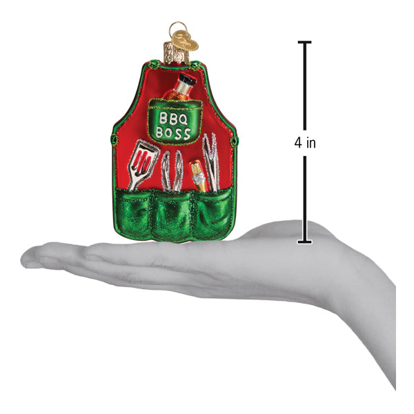 a hand holding a christmas ornament