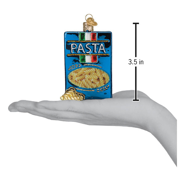 a hand holding a blue and gold ornament
