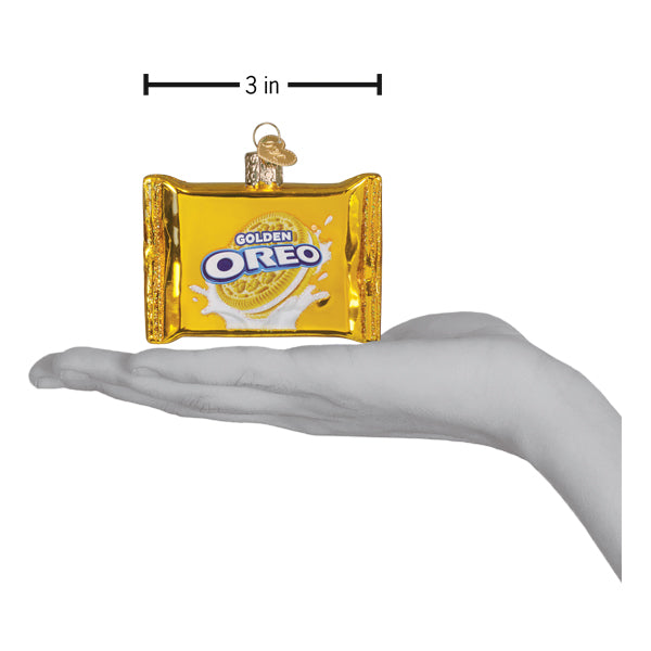 a hand holding a small package of food