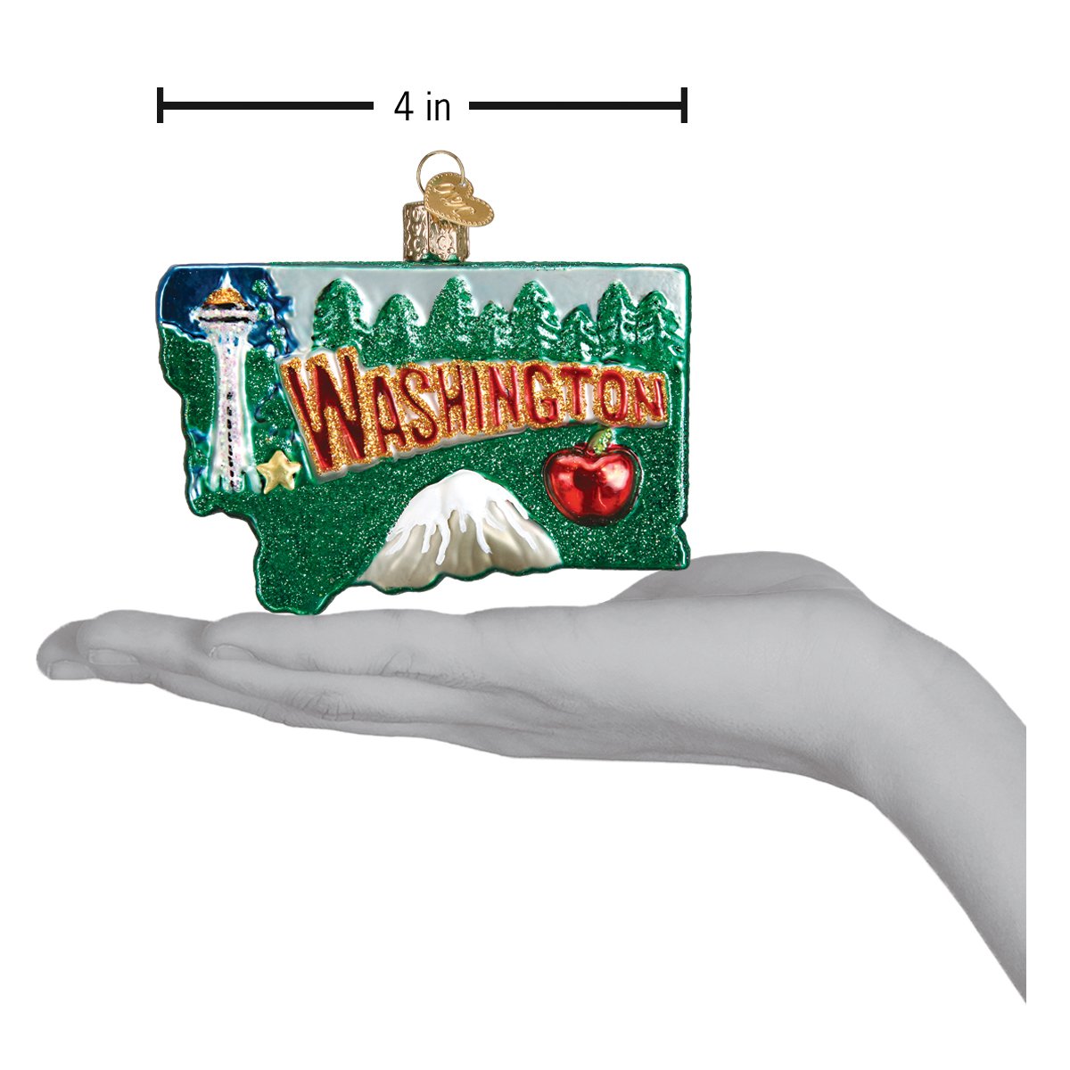 a hand holding a christmas ornament