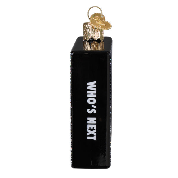 a black box with a gold object in it