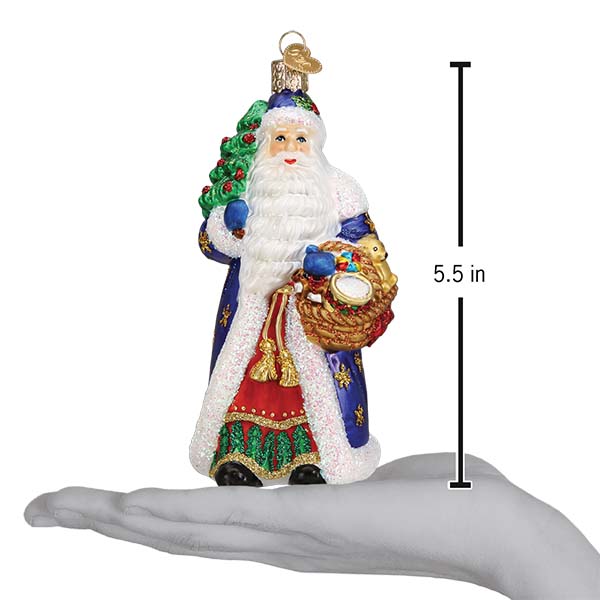 a hand holding a christmas ornament