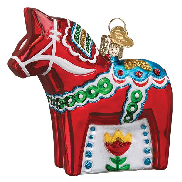 a red horse ornament with gold trim