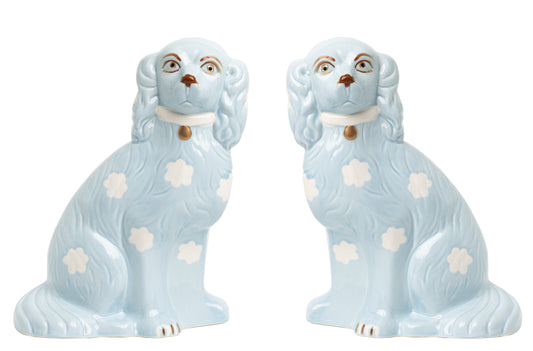 a pair of ceramic dogs