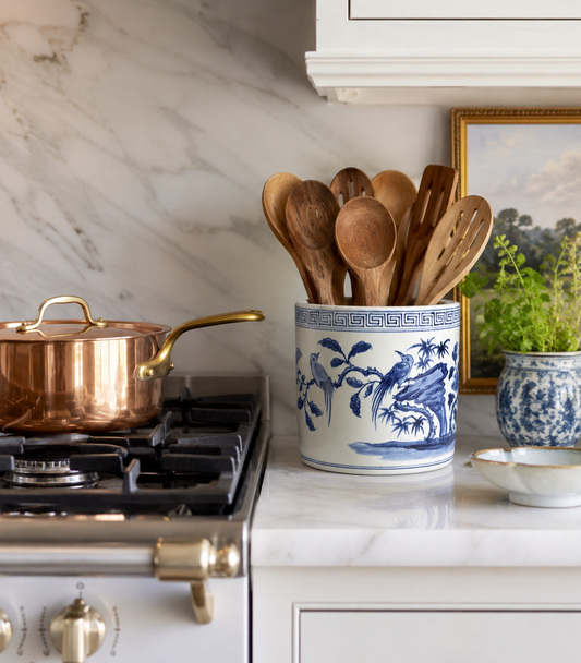 a pot and spoons on a stove