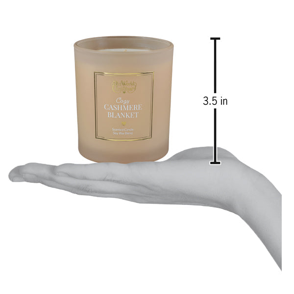 a hand holding a candle