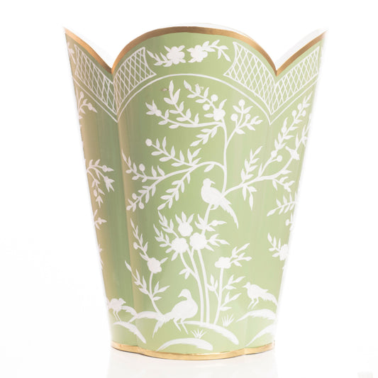 a green vase with white and gold trim