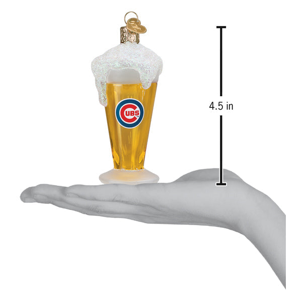 a hand holding a glass of beer