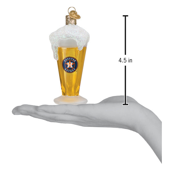 a hand holding a glass of beer