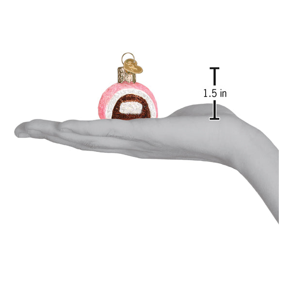 a hand holding a christmas ornament