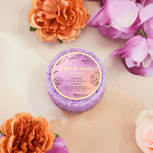 a round object with a label next to flowers