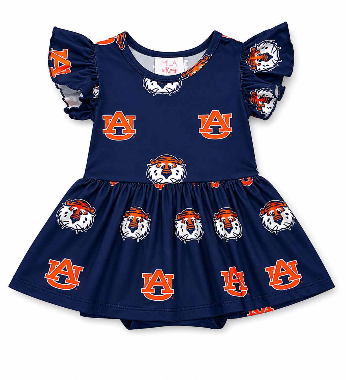 a blue dress with orange and white tiger designs