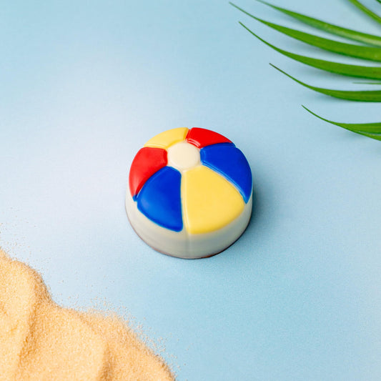 a beach ball on a blue surface