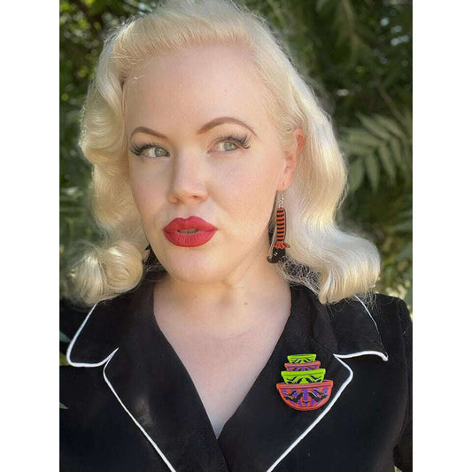a woman with blonde hair and red lipstick
