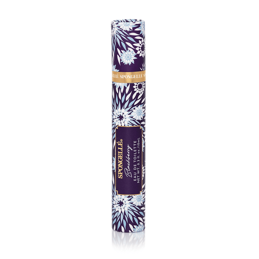 a purple and white tube with a gold label
