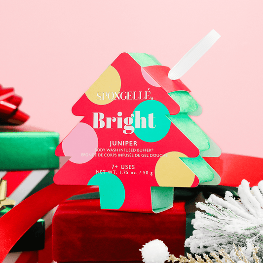 a red and green box with a white ribbon and a red bow