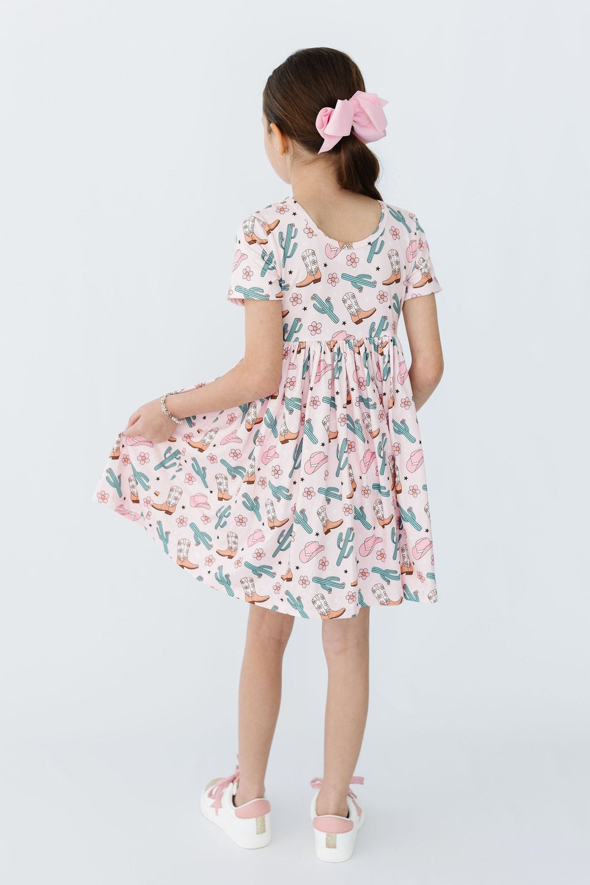a girl in a dress