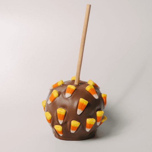 a candy corn on a stick