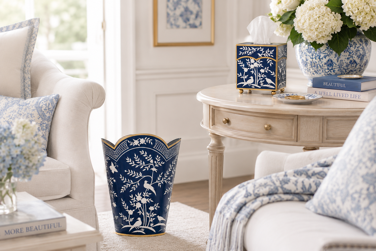 a blue and white vase on a table