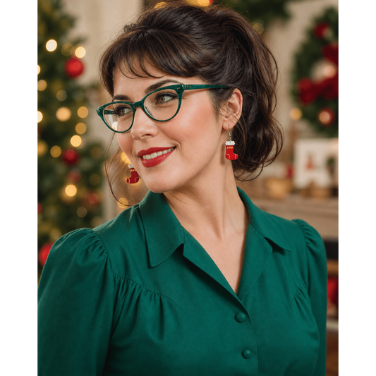 a woman in green dress and green glasses