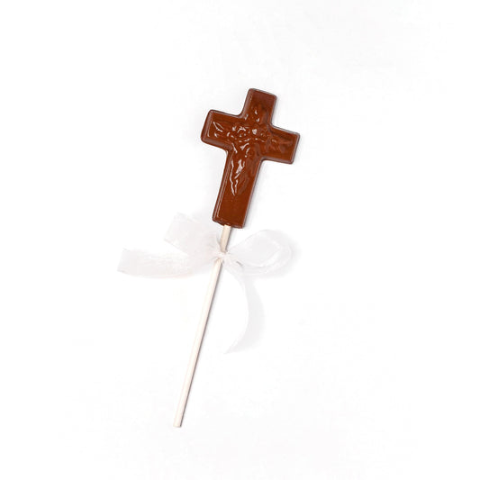 a chocolate cross on a stick