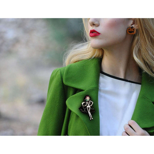 a woman wearing a green coat