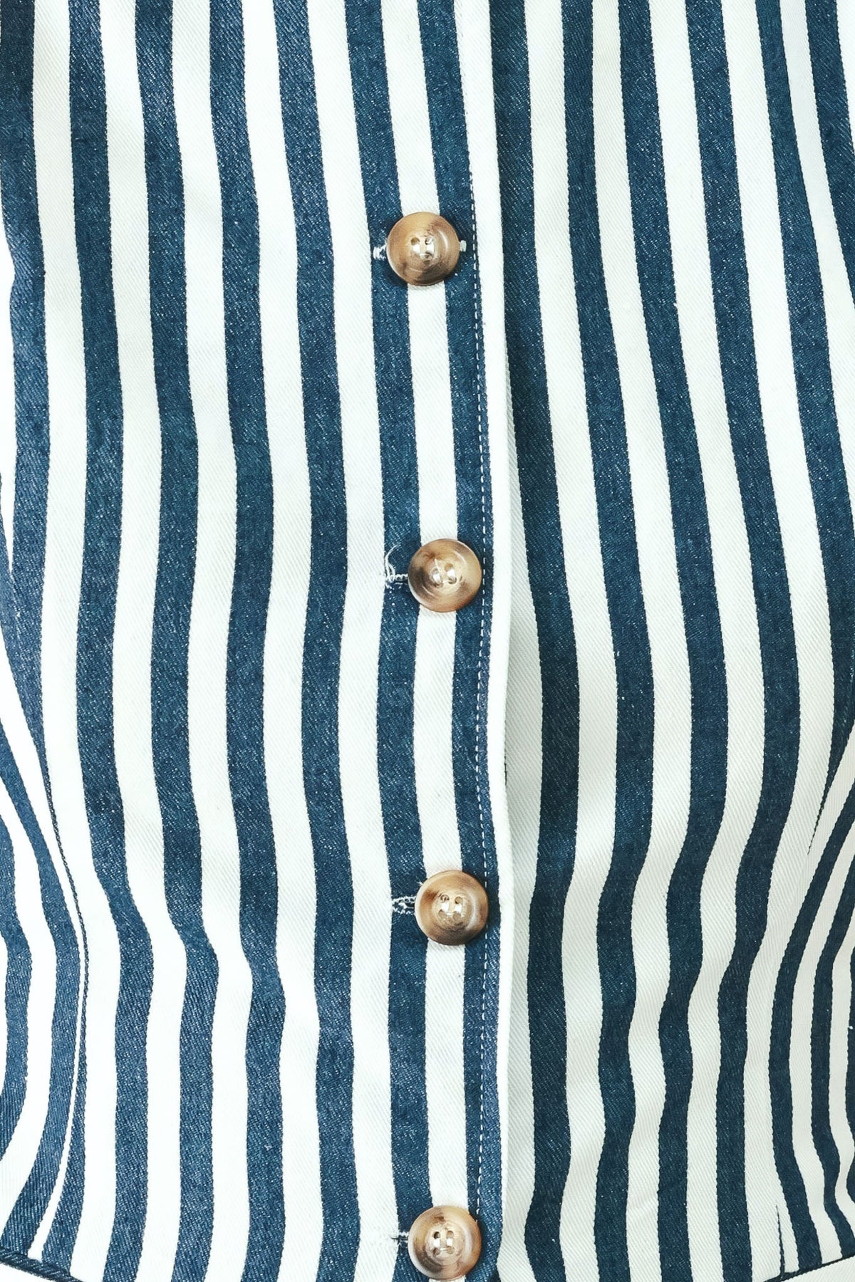 a close up of a buttoned shirt