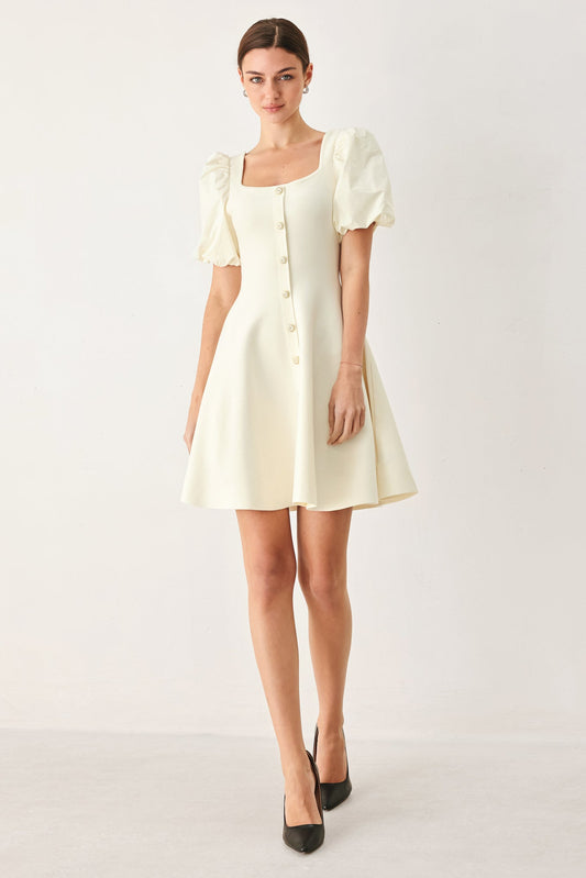 a woman in a white dress
