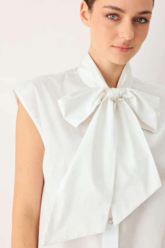 a woman wearing a white shirt