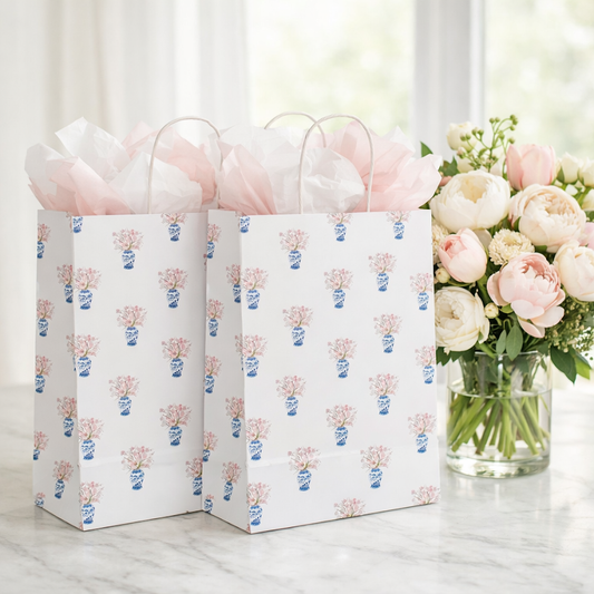 two bags with flowers in a vase