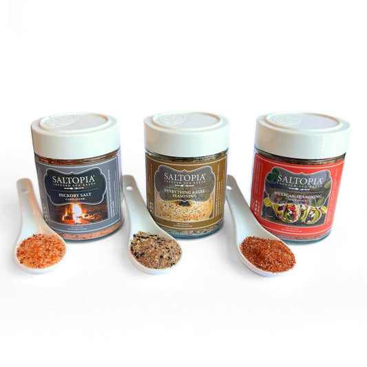 a group of containers with different spices