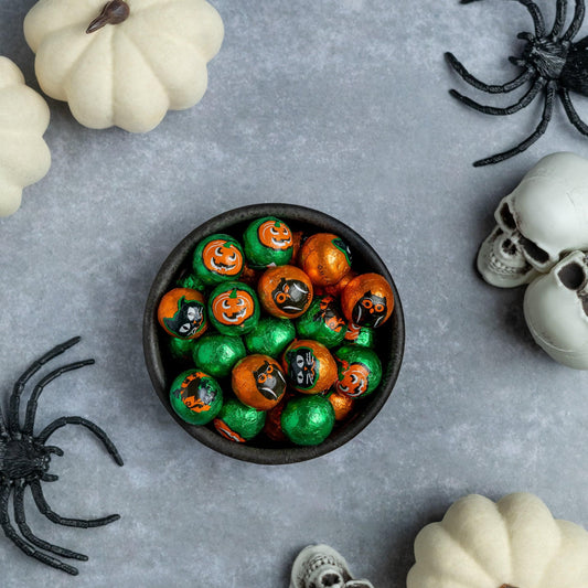 a bowl of candy and skulls