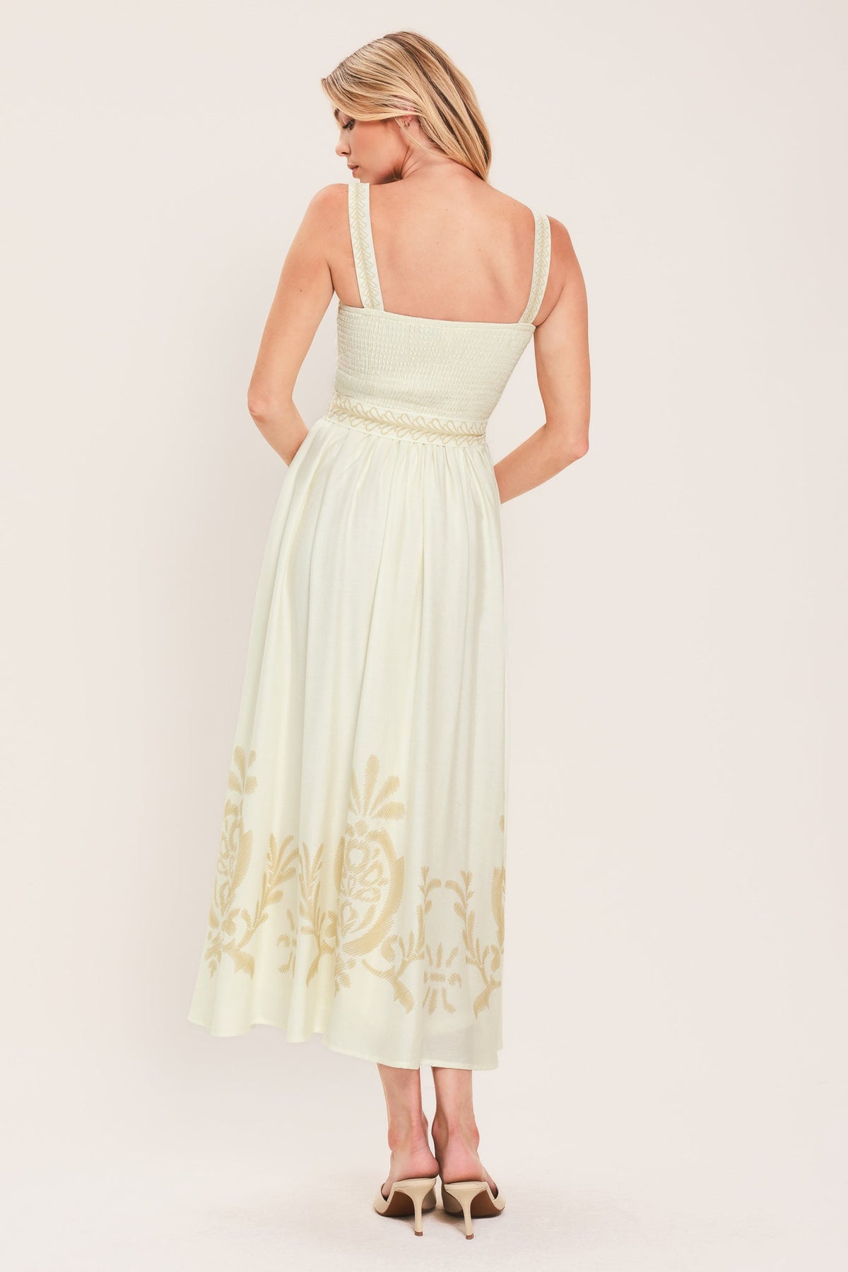 a woman in a white dress