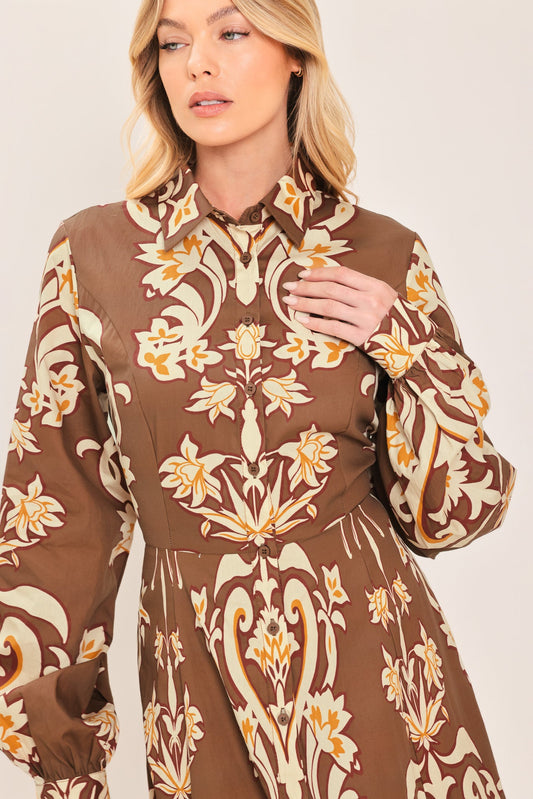 a woman wearing a brown dress